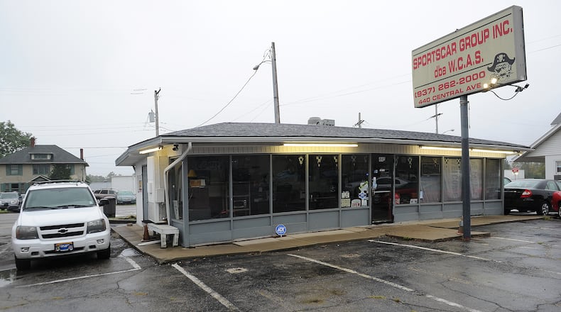 The city of West Carrollton will purchase a soon-to-be vacant auto dealer business at 440 East Central Ave.  this month and demolish the structure. MARSHALL GORBY\STAFF