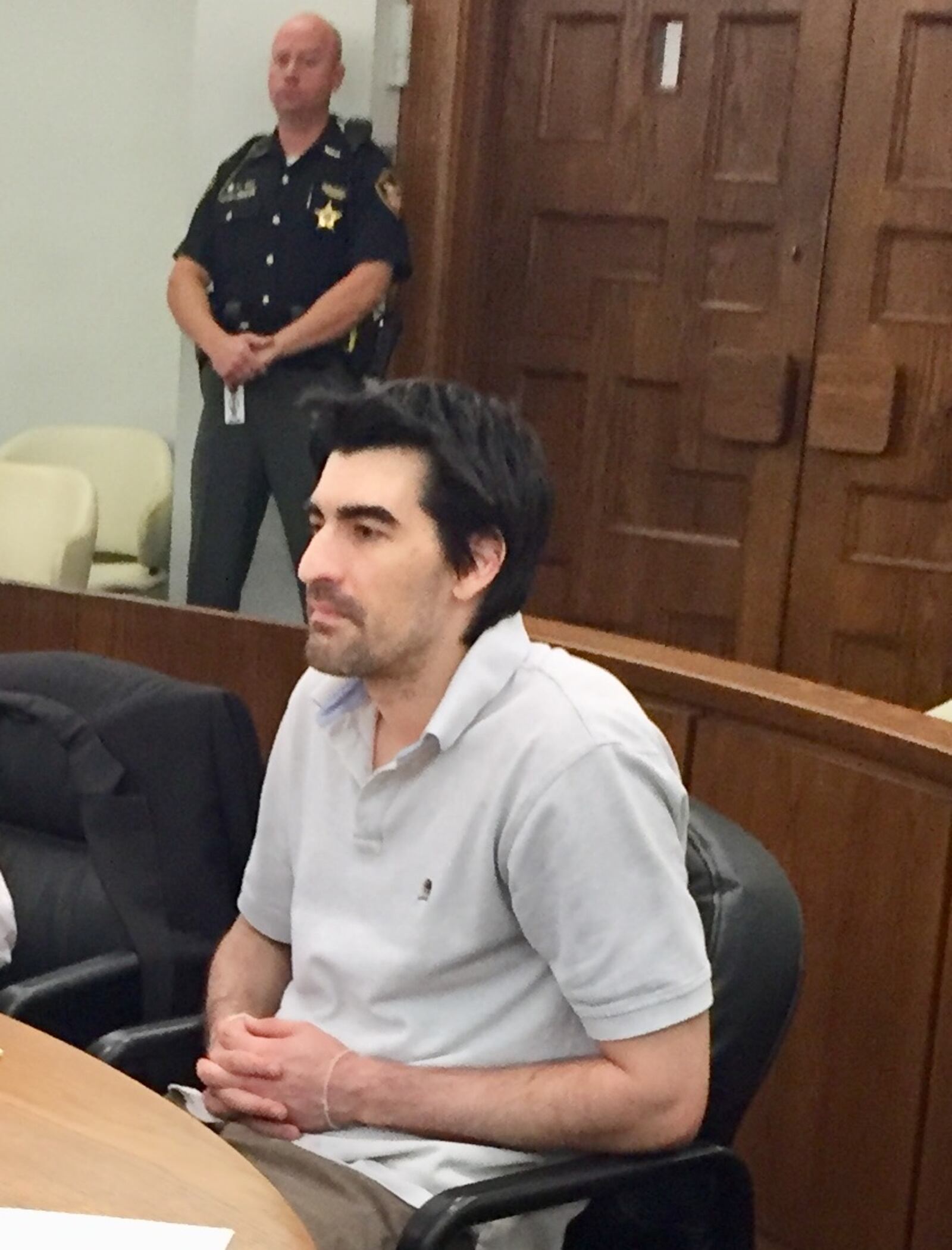 Charles Hiser sits in a Miami County courtroom as the judge presiding over his child rape trial declares a mistrial. STAFF PHOTO/Steve Baker