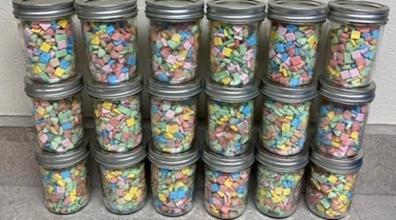 Approximately 7,200 pills contained a mixture of methamphetamine and ecstasy were recovered by detectives in Trotwood on Sept. 1, 2022. Six kilograms of fentanyl, firearms and money were also seized during the search, according to the Montgomery County RANGE Task Force. Photo courtesy Montgomery County RANGE Task Force.