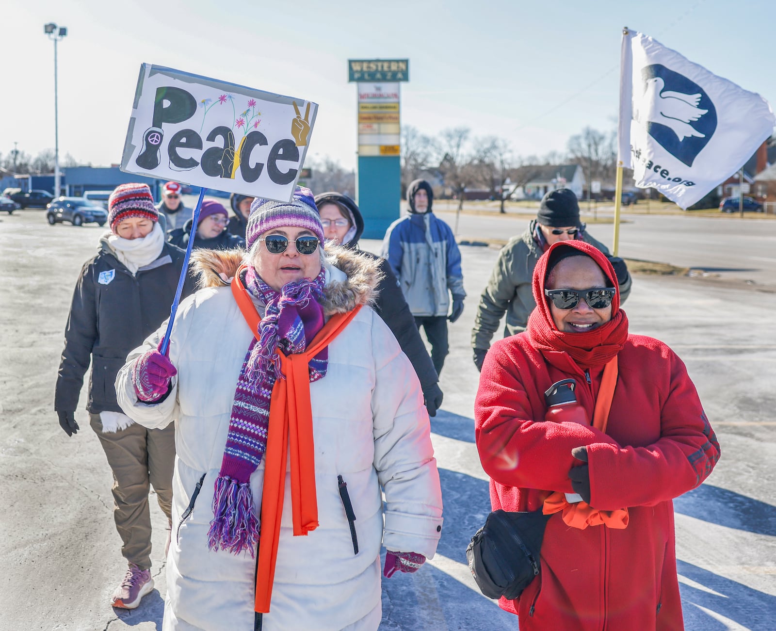 Marchers participate in a Peace Walk for the National Day of Action hosted by Indivisible Springfield on Tuesday, Jan. 20, 2026, in Springfield. JOSEPH COOKE/STAFF