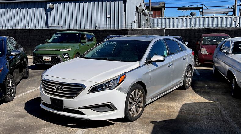 A Hyundai sedan sits in the parking lot of East Bay Tow Inc., where Attorney General Rob Bonta held a news conference, Thursday, April 20, 2023, in Berkeley, Calif., about the surge in thefts of KIA and Hyundai vehicles. AP FILE