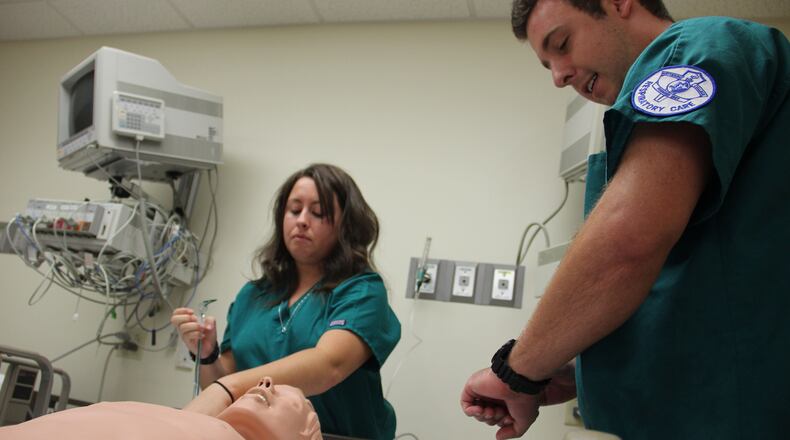 Robert Ptacek and Danielle Kilburn practice bag masking and CPR. Both are second-year students in the Respiratory Therapy program at Kettering College.
