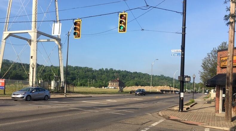 West Carrollton officials plan to seek bids later this month on a plan to restructure West Central Avenue from four lanes to three lanes and add on-street parking. The project is being done in anticipation of the opening of a $4.3 million volleyball complex with a restaurant and bar. NICK BLIZZARD/STAFF