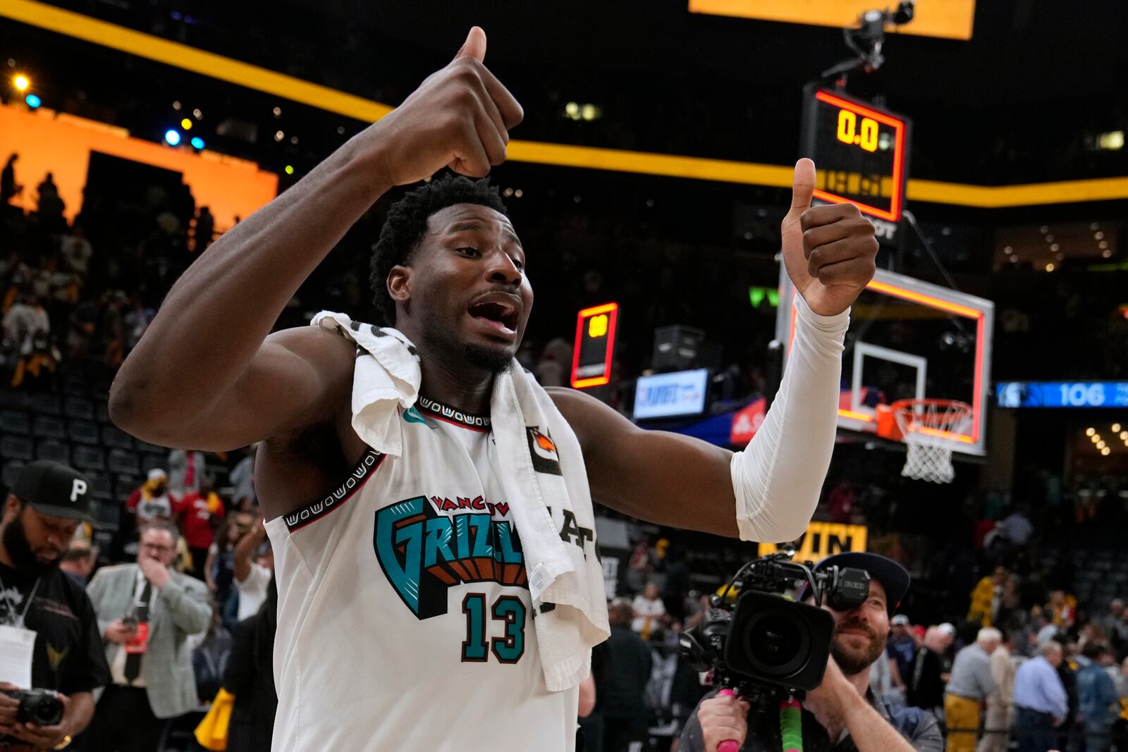 Memphis Grizzlies forward Jaren Jackson Jr. (13) celebrates the team's win after an NBA play-in tournament basketball game against the Dallas Mavericks, Friday, April 18, 2025, in Memphis, Tenn. (AP Photo/George Walker IV)