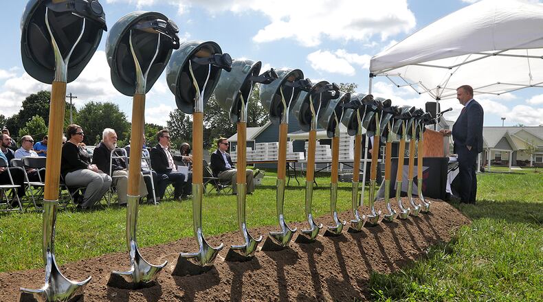 Ian Maute, from Buckeye Community Hope Foundation, speaks during the groundbreaking celebration for the next phase of The Community Gardens Tuesday, Sept. 13, 2022 in Springfield. BILL LACKEY/STAFF