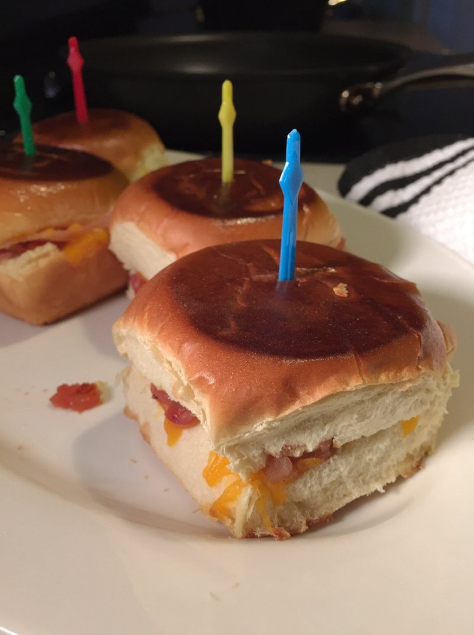 You’ll be the Super Bowl Party Food Champ with these Grilled Cheese Sliders with Pancetta and Tomato Marmalade. CONNIE POST/STAFF