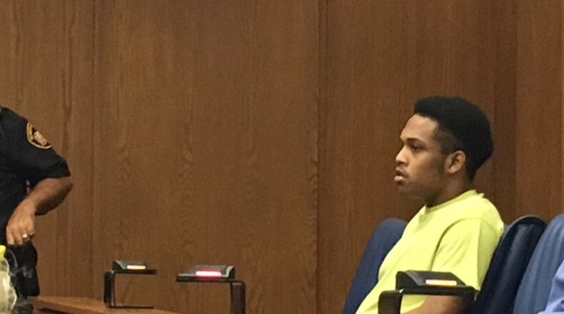 Charles Vincent Ashford awaits his time in court Wednesday on multiple felony charges after being shot by police and arrested as a suspect in a February Miamisburg armed robbery. NICK BLIZZARD/STAFF
