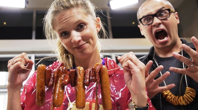 Amelia Rayno and Tom Horgen demonstrate how to make meat necklaces. (Mark Vancleave/Minneapolis Star Tribune/TNS)