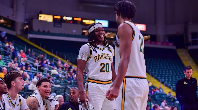Wright State University's Andrea Holden talks to teammate Logan Woods during their game against Franklin College on Nov. 3, 2025 at the Ervin J. Nutter Center. JOSEPH R. CRAVEN / STAFF PHOTO