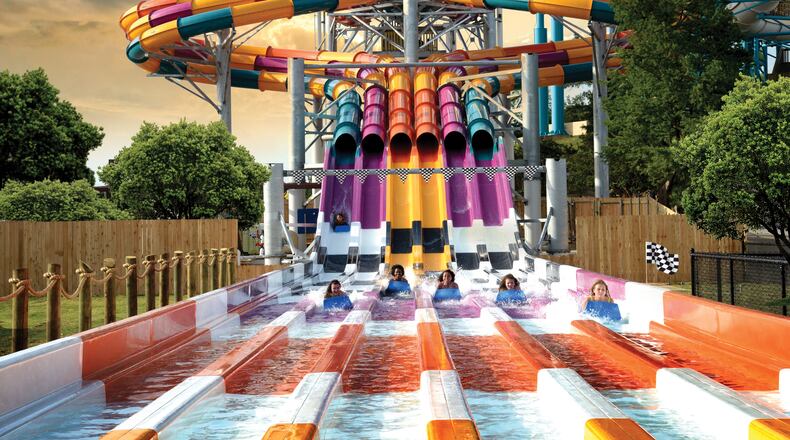 Wahoo Racer, a 60-foot-tall six-lane racing slide featuring twists and turns, is a popular ride at Six Flags White Water.