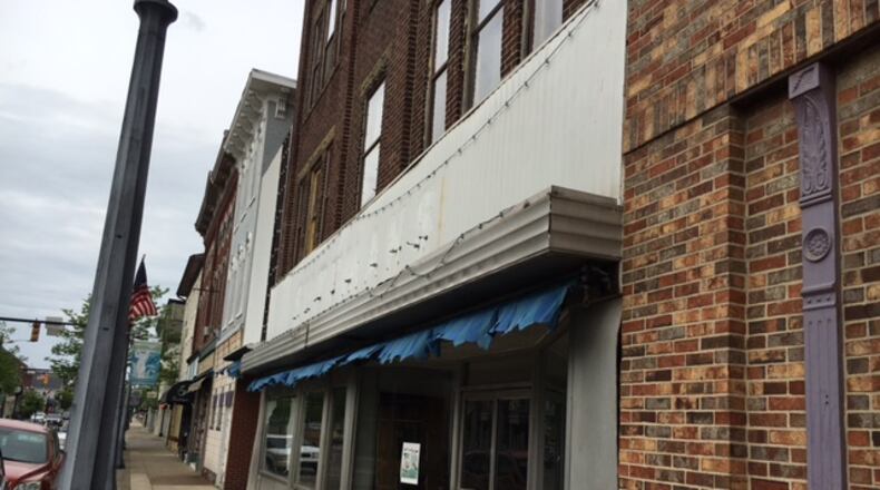 Part of a building construction around 1900 will be demolished in downtown Miamisburg with a goal of redeveloping the space for more housing and retail space. NICK BLIZZARD/STAFF