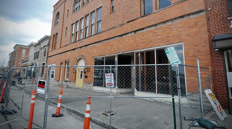 Demolition began early Wednesday March 29, 2023 on the Tavern building at 112-118 West Main Street in downtown Troy, but it was quickly stopped by city officials. A court hearing on the issue was scheduled that afternoon. MARSHALL GORBY\STAFF