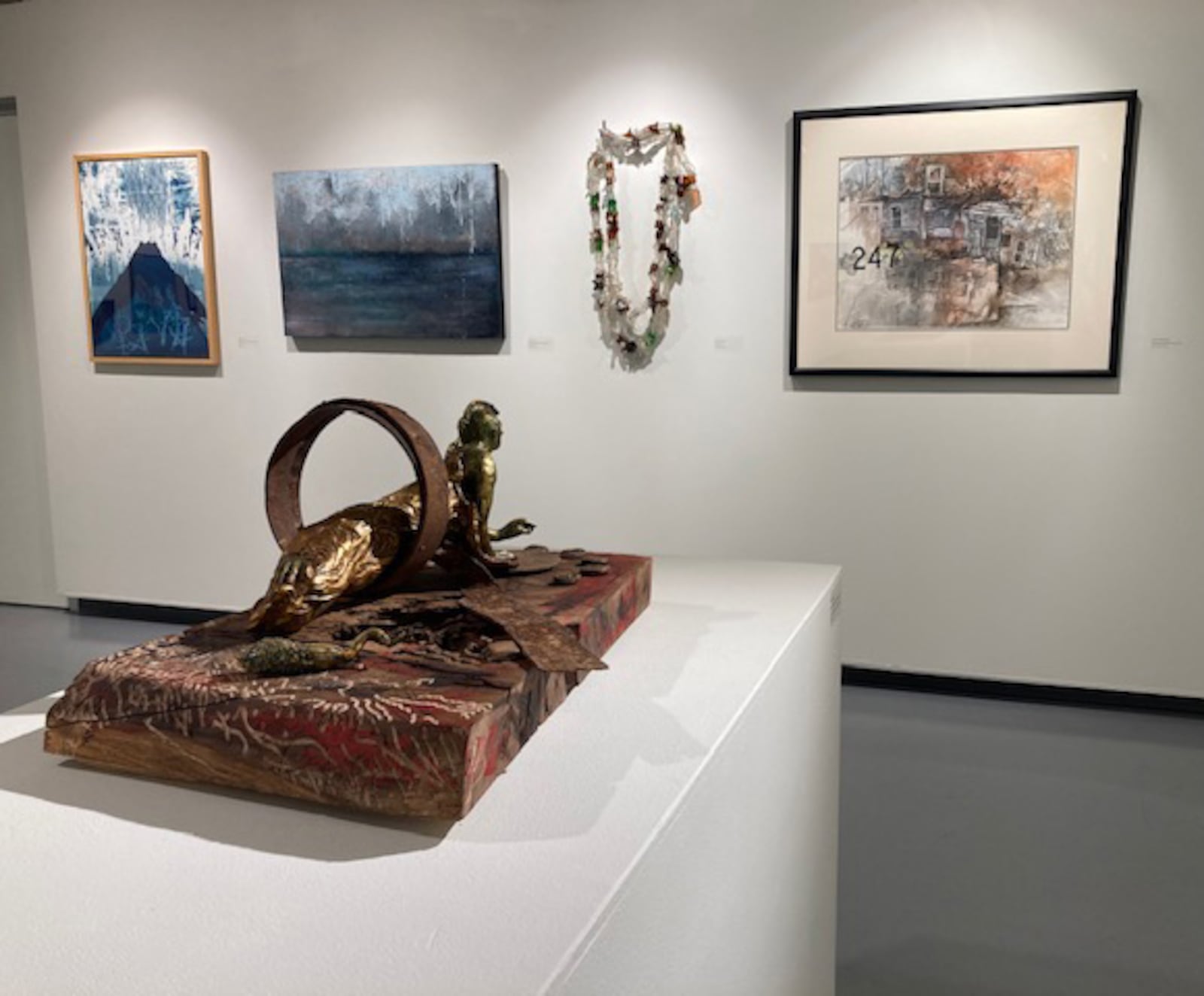 A range of mixed media works are included in the landscape show. Shannon Gallion’s 'Lariat' (in background) is made of broken glass bottles found along a riverbank. CONTRIBUTED