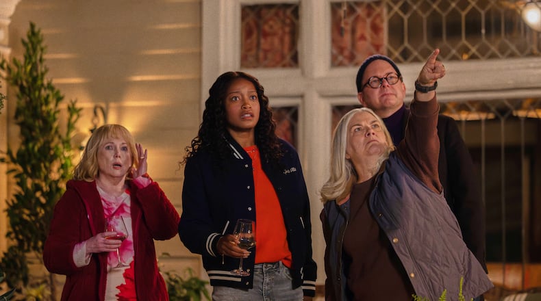This image released by Peacock shows Julia Duffy, from left, Keke Palmer, Paula Pell and Mark Proksch in a scene from "The Burbs." (Elizabeth Morris/Peacock via AP)