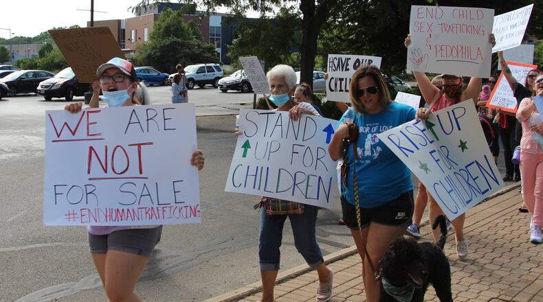 Several dozen people gathered in downtown Springfield Saturday afternoon to raise awareness to human trafficking and child exploitation.
