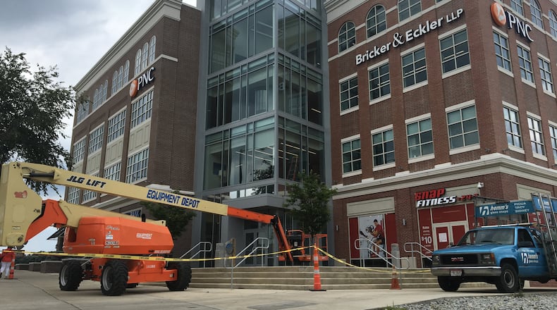 The new office building at Water Street is filled, and developers want to build a hotel next door. CORNELIUS FROLIK/STAFF