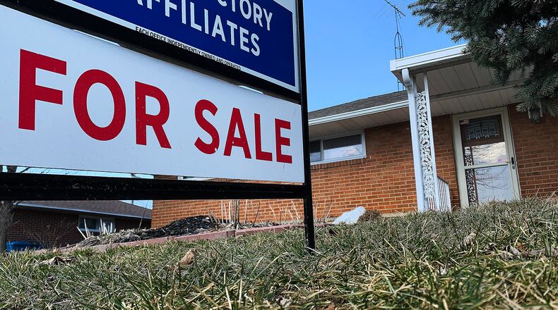 A house for sale on Seaman Drive in Huber Heights. According to Dayton Realtors Multiple Listing Service, there were 751 transactions reported during January, a 14.9% decrease compared to January 2024. MARSHALL GORBY/STAFF