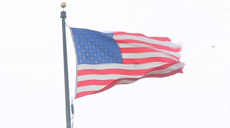 Flag blowing in the wind in Dayton. (File photo by Marshall Gorby/Staff)