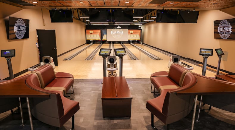 The five-lane social suite is one of several new additions at RollHouse Dayton. The former Marian Lanes location in Huber Heights is reopening later this month. The entertainment center has a total of 33 lanes, an arcade and social lounge, an 8-lane private bowling suite with bar and updated kitchen. BRYANT BILLING/STAFF