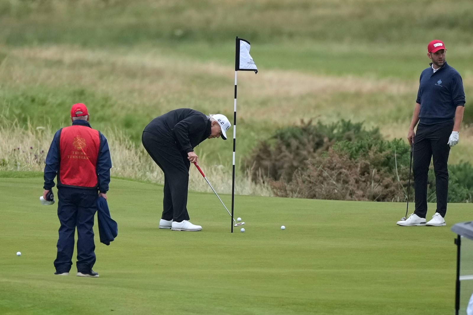 President Donald Trump plays golf at the Trump Turnberry golf course in Turnberry, Scotland, Sunday, July 27, 2025.(AP Photo/Alastair Grant)