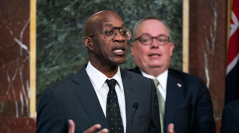 FILE - Edwin Moses, chairman of the U.S. Anti-Doping Agency, speaks at a news conference during a White House event aimed at reforming the World Anti-Doping Agency, in Washington on Oct. 31, 2018. Moses, the American gold-medal hurdler who had a key role in sorting through the Russian scandals, recalled trying to explain Moscow's point of view to anti-doping leaders. "One thing I was always trying to get across to them was, 'You don't understand how important sports are to them,'" Moses said. (AP Photo/J. Scott Applewhite, File)
