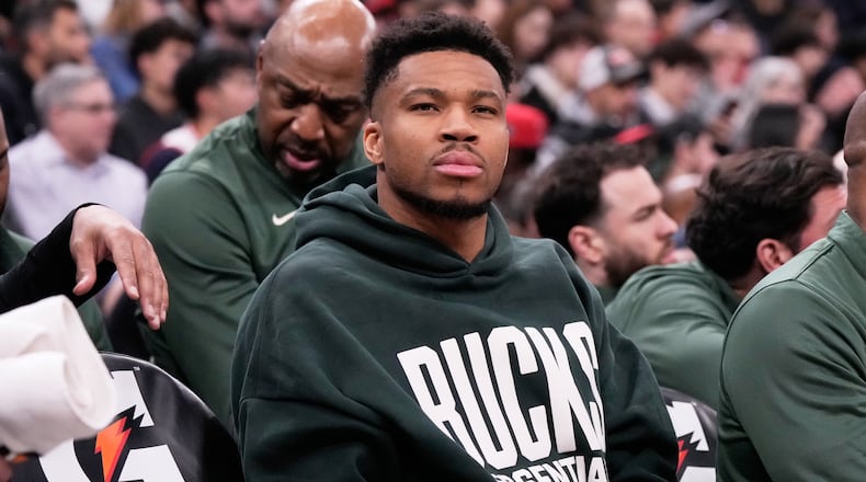 Milwaukee Bucks forward Giannis Antetokounmpo watches teammates during the first half of an NBA basketball game against the Chicago Bulls in Chicago, Sunday, March 1, 2026. (AP Photo/Nam Y. Huh)