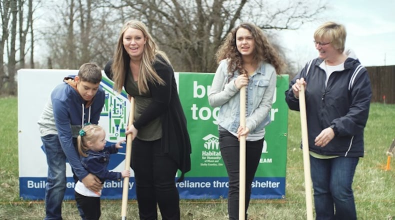 Karen Mullen and her three children – Jaden, Delaney and Sailor, will live in a home being built by Airstream and Habitat for Humanity