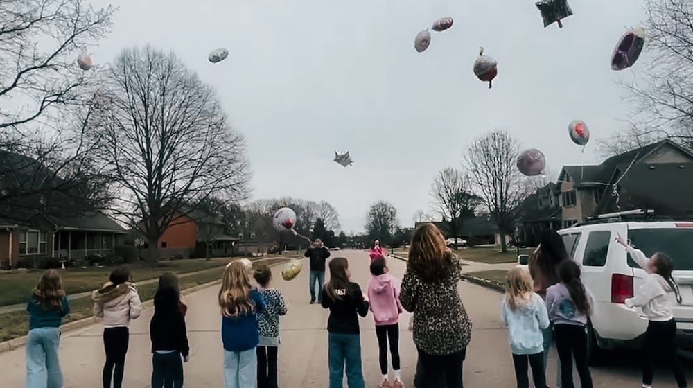 Family and friends gathered Tuesday, Feb. 24, 2026, to celebrate what would have been Ashley Flynn's 38th birthday. She was shot and killed Feb. 16 inside her Tipp City house. CONTRIBUTED