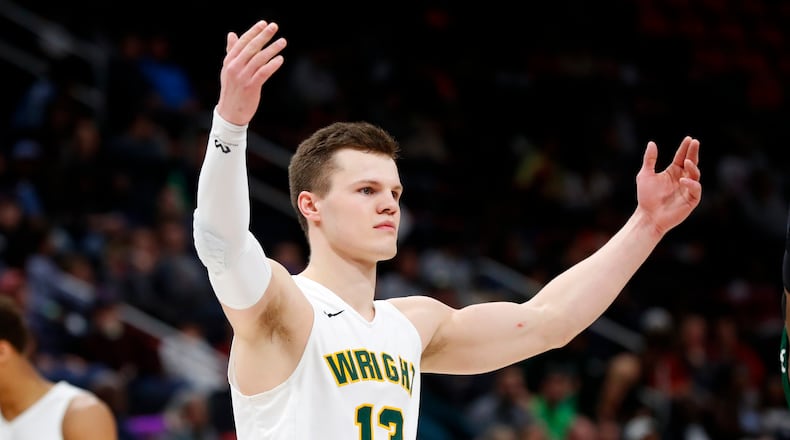 Wright State’s guard Grant Benzinger celebrate’s during their 74-57 win against Cleveland State during the second half of an NCAA basketball game in the Horizon League tournament championship in Detroit, Tuesday, March 6, 2018. (AP Photo/Paul Sancya)