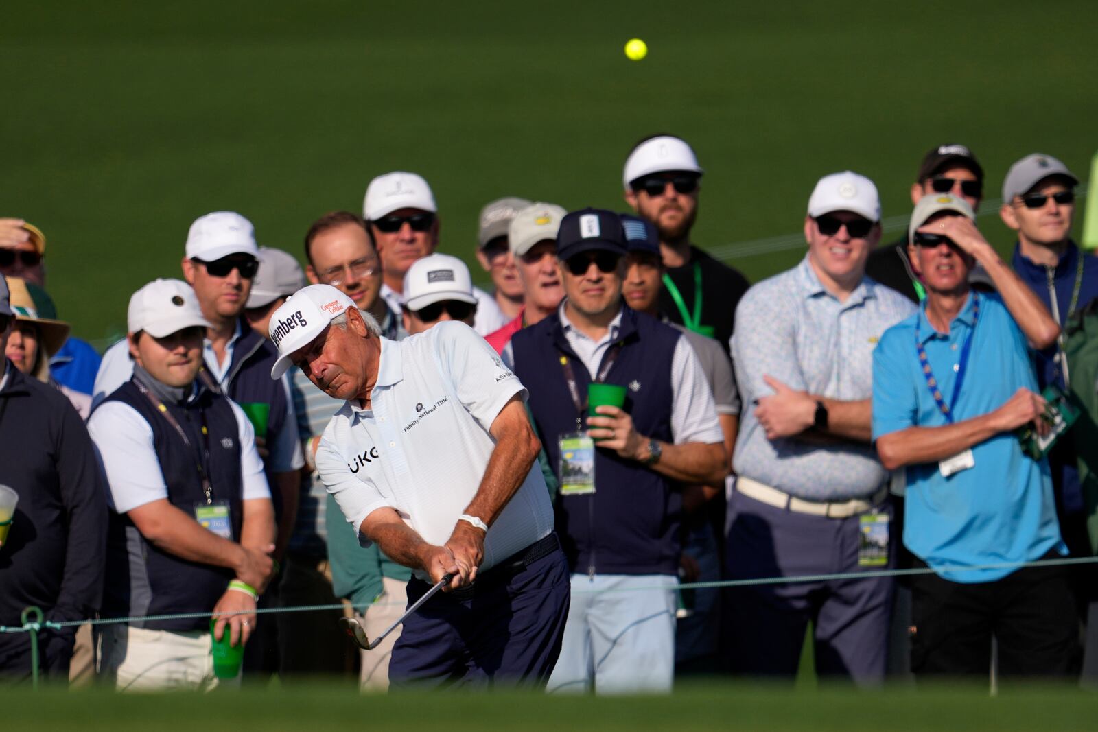 Fred Couples chips to the green on the second hole during the first round at the Masters golf tournament, Thursday, April 10, 2025, in Augusta, Ga. (AP Photo/George Walker IV)