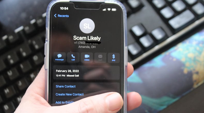 Smart phones sometimes give notice that a call might be from a scammer. CORNELIUS FROLIK / STAFF