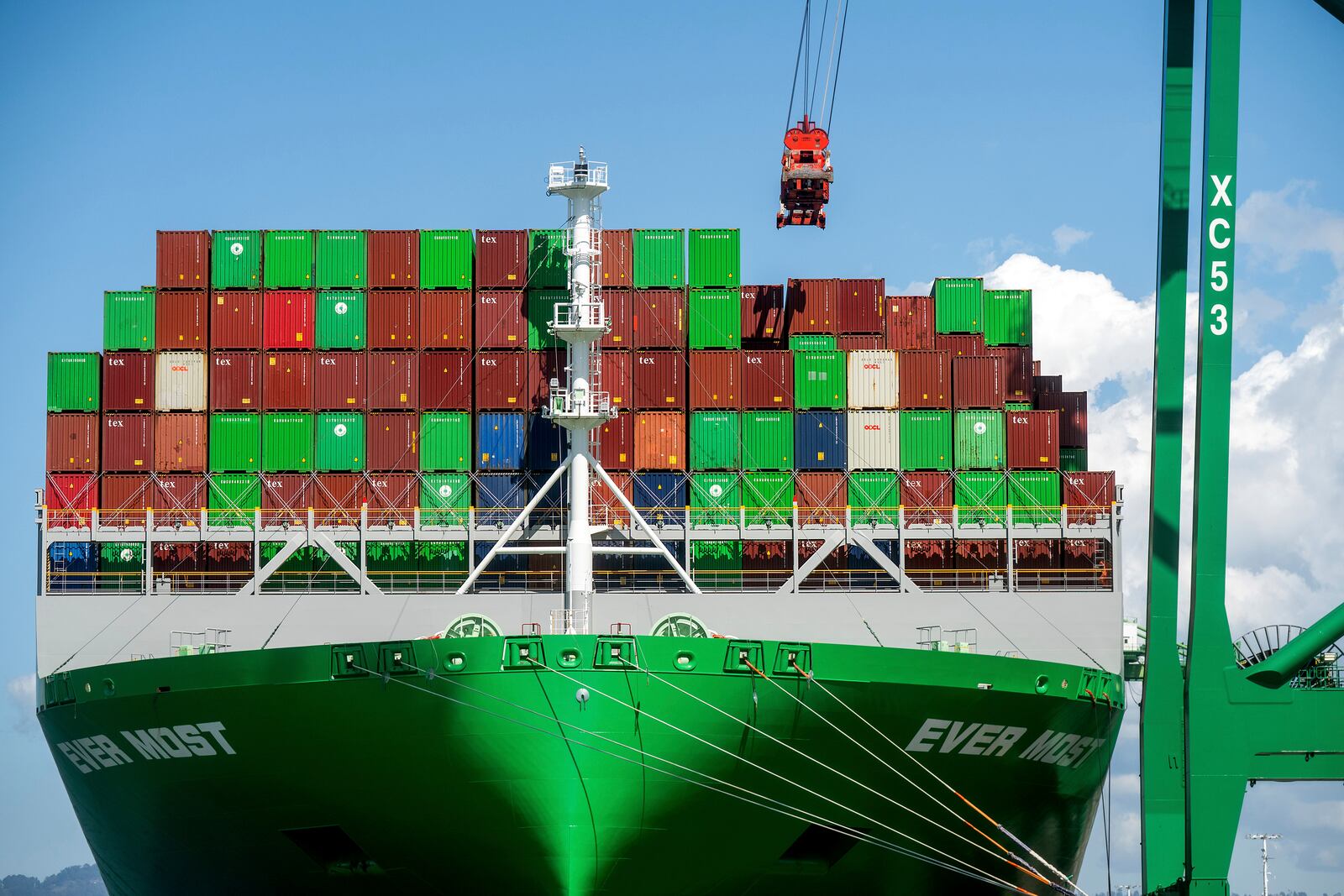 Shipping containers line the Ever Most cargo vessel docked at the Port of Oakland on Thursday, April 3, 2025, in Oakland, Calif. (AP Photo/Noah Berger)