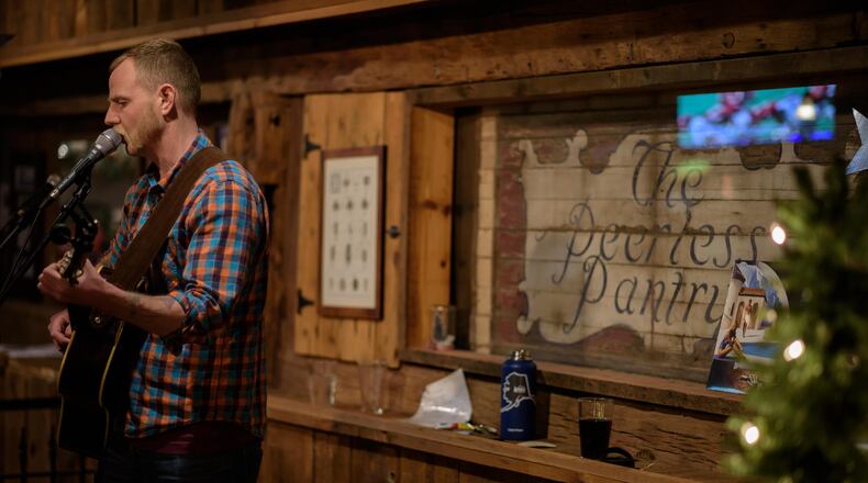 The Starlight City Market at Star City Brewing Company in Miamisburg held an ugly Christmas sweater party Dec. 14. The event also featured live music from Harold Hensley and Billy Swayne of Neo American Pioneers and craft vendors. TOM GILLIAM / CONTRIBUTING PHOTOGRAPHER