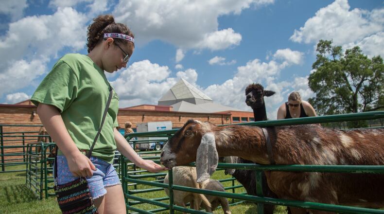 Members and non-members of the Dayton Jewish community celebrated an afternoon of traditions, faith, food, drinks and entertainment at Temple Israel, 130 Riverside Drive, Dayton, on Sunday, June 5. (TOM GILLIAM/CONTRIBUTED)