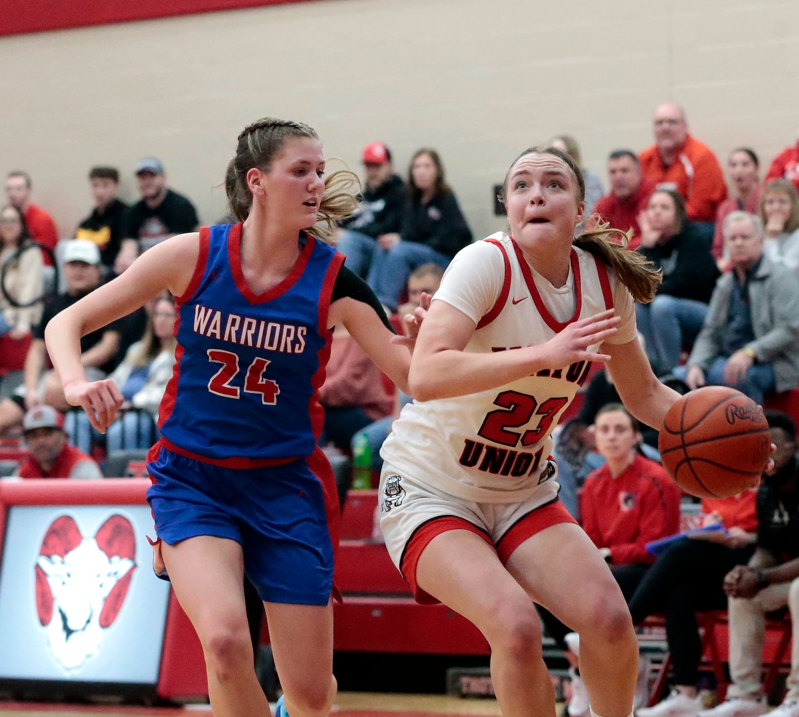 Milton-Union junior Michaela Firks drives past Northwestern sophomore Lilly Bushey during their game on Wednesday, Feb. 18, 2026 at Trotwood Madison High School. STEVEN WRIGHT / STAFF