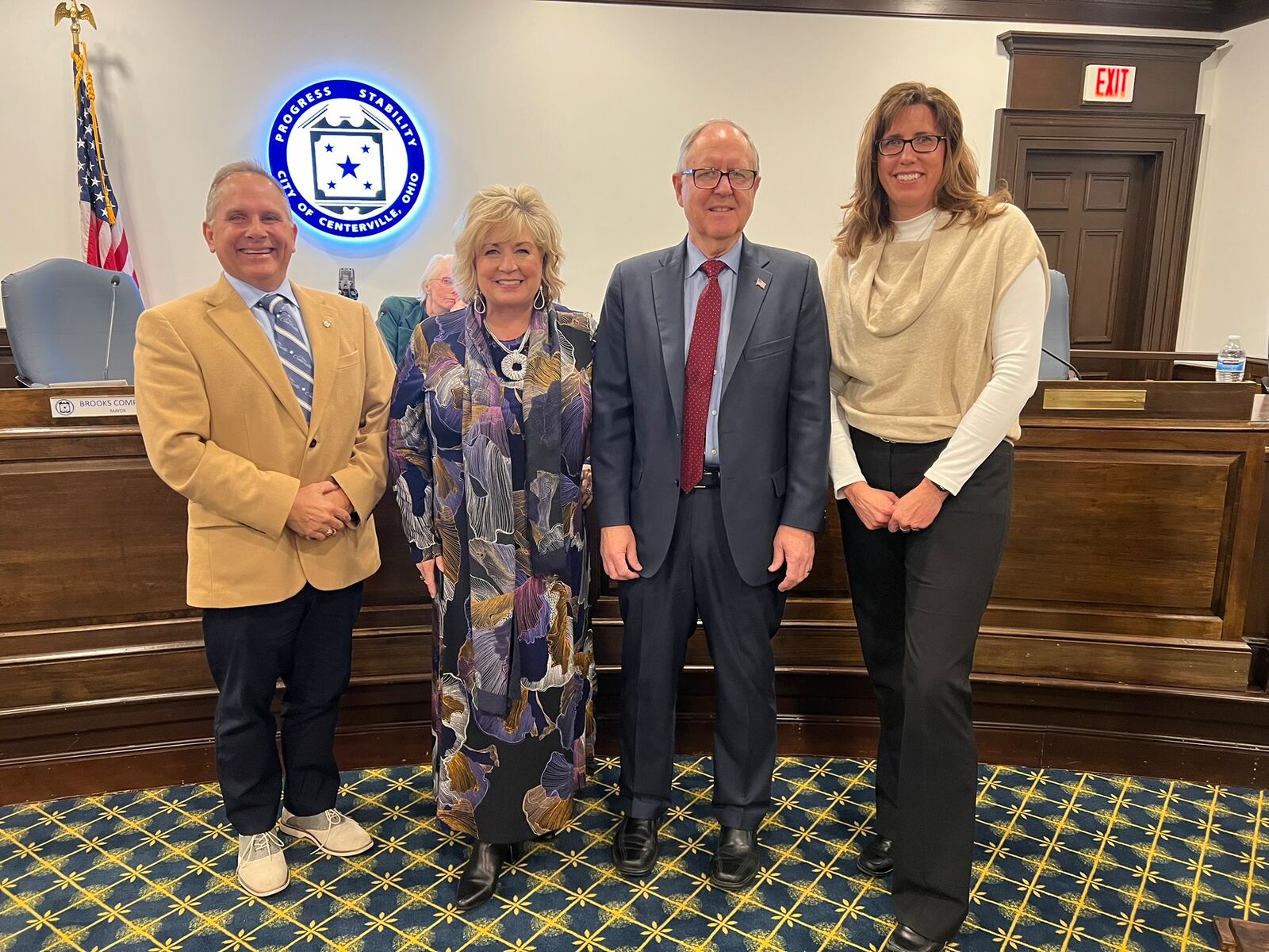 Centerville Councilmember-Elect Mark Engert, Councilmember-Elect Belinda Kenley, Mayor-Elect Brooks Compton and Councilmember-Elect Jennifer McLaughlin pose for a photo after taking the oath of office Monday, Dec. 18, 2023 at a Centerville City Council meeting.