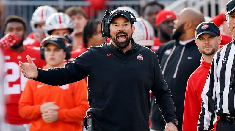 Ohio State head coach Ryan Day questions a referee's call during the second half of an NCAA college football game against Michigan on Saturday, Nov. 26, 2022, in Columbus, Ohio. (AP Photo/Jay LaPrete)