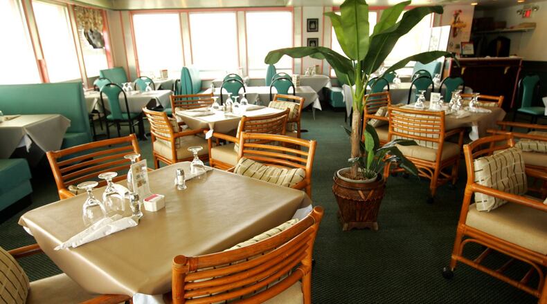 An employee of Thai 9 will purchase the House of Thai in Beavercreek, House of Thai's owner says. This file photo shows the interior of the House of Thai in 2008.