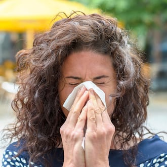 Seasonal allergies occur when your immune system incorrectly identifies foreign substances like pollen, grass or mold as harmful and produces antibodies to try to fight off these substances. MICHAEL HEIM / SHUTTERSTOCK