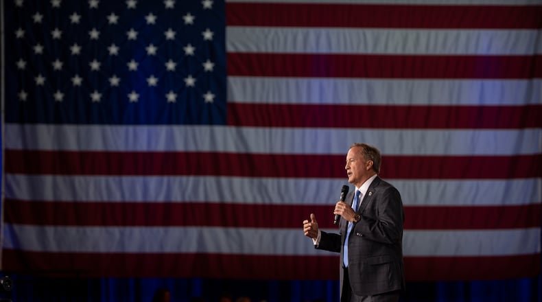 Texas Attorney General Ken Paxton speaks at the Ronald Reagan dinner during the Conservative Political Action Conference (CPAC) in Dallas, Friday, March 27, 2026. (AP Photo/Gabriela Passos)
