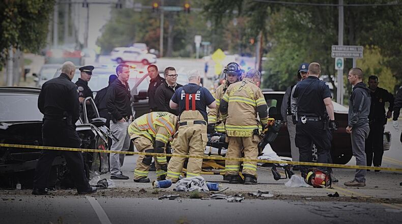 A police pursuit involving multiple jurisdictions ended after the reported stolen vehicle traveled the wrong-way on U.S. 35 East and crashed near the highway overpass at Grange Hall Road Wednesday Oct. 16. 2019. MARSHALL GORBY/STAFF
