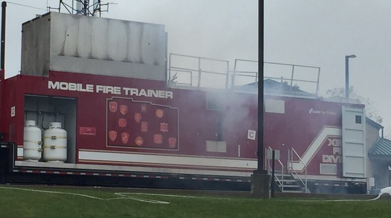 The city of Xenia’s mobile fire trainer was in Beavercreek Thursday, Oct. 20, 2016 where firefighters receive fire training in a safe environment. JAROD THRUSH/STAFF