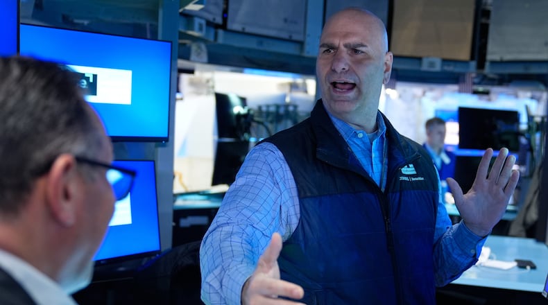 Philip Finale works on the floor at the New York Stock Exchange in New York, Tuesday, March 10, 2026. (AP Photo/Seth Wenig)