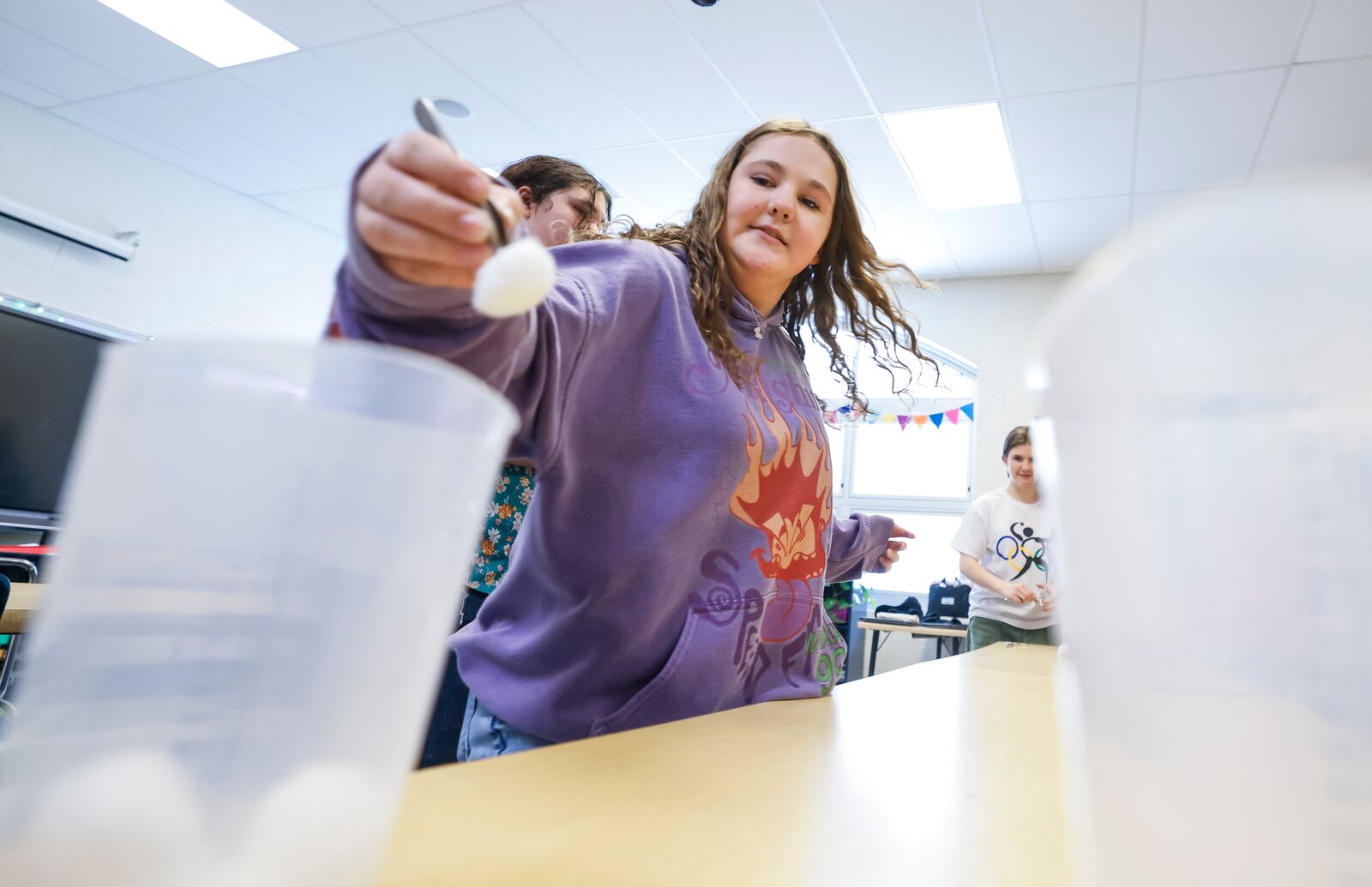 Amiah Grace learns to use medical tools during an adopt a class session with a crew from Kettering Health Hamilton Family Birth Place department, at Wilson Middle School Friday, April 11, 2025 in Hamilton. NICK GRAHAM/STAFF