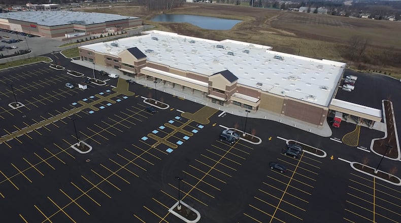The new 125,000-square-foot Kroger store being built on Feedwire Road in Centerville will open by late May or early June, according to the company. The Cincinnati-headquartered grocery retailer is set to open the store on about 15 acres between Costco and Cabelas, facing south toward Feedwire Road. TY GREENLEES / STAFF