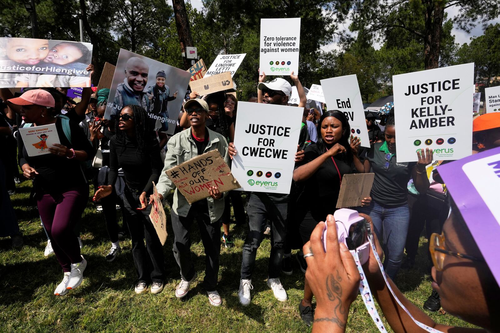 Activists chant slogans during the women's protest and hand over of a petition demanding that gender-based violence and femicide be declared a national disaster, at the Union Buildings in Pretoria, South Africa, Friday, April 11, 2025. (AP Photo/Themba Hadebe)