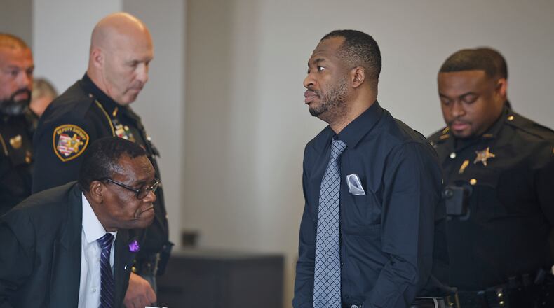 Hermanio Joseph is led back to jail Wednesday, May 1, 2024 after being found guilty on all charges in Clark County Common Pleas Court. BILL LACKEY/STAFF