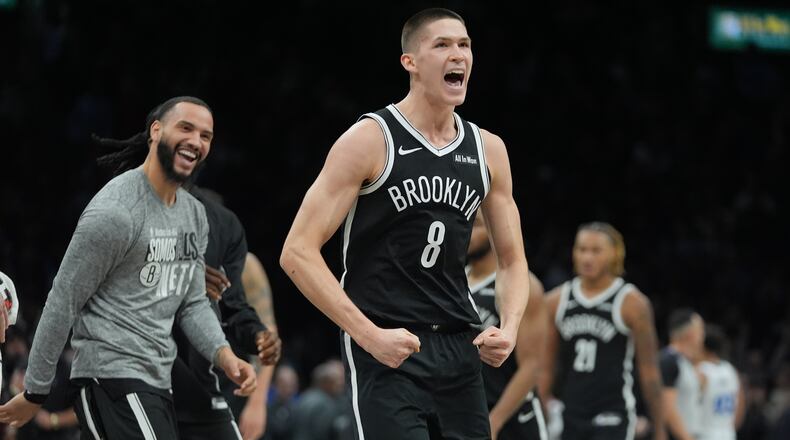 Brooklyn Nets' Egor Demin (8) celebrates after making a three-point shot during the second half of an NBA basketball game against the Orlando Magic Wednesday, Jan. 7, 2026, in New York. (AP Photo/Frank Franklin II)