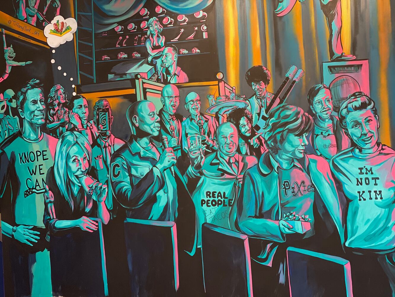 PHOTOS: Wild and wacky murals take over new restaurant at The Greene
