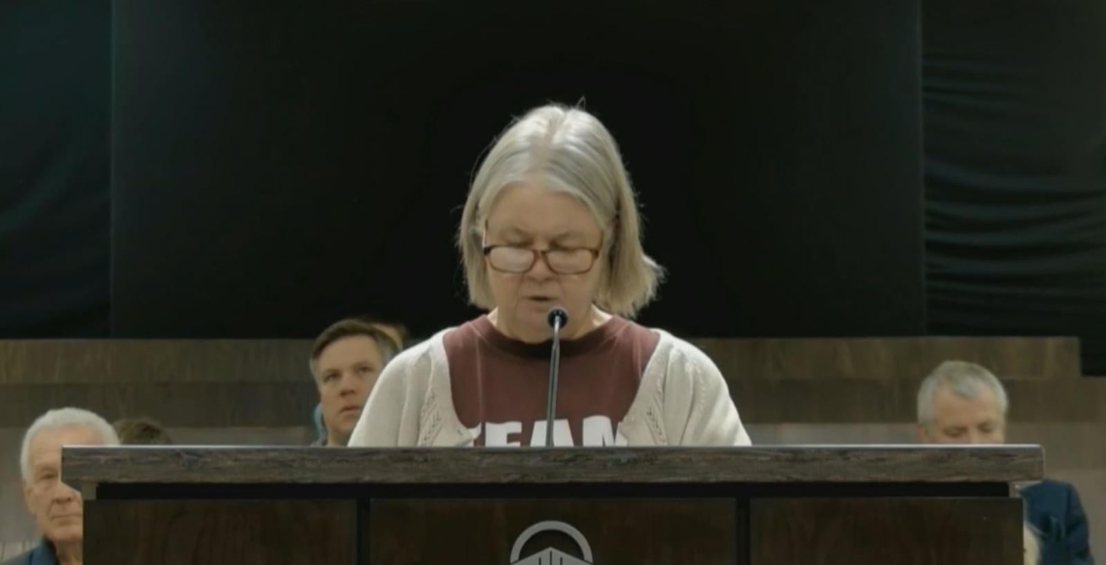 Beth Holten, of Kettering, speaks during the Feb. 10, 2026 Kettering City Council meeting with concerns about immigration enforcement, asking the council to oppose a number of bills proposed in the Ohio General Assembly, similar to what the mayor of Akron did in a recent statement. CONTRIBUTED